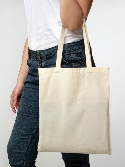 No Plastic. Unrecognizable Lady Holding Eco Bag Posing Over White Background In Studio. Panorama, Cropped, Copy Space
